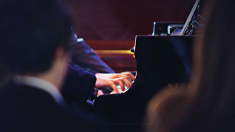 Leeds Conservatoire Student playing a Steinway concert grand piano at Besbrode Pianos