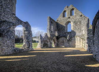The ruins of the old Priory guesthouse neighbour the Priory church