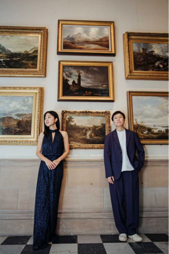 Baichuan Hui and Yura Zaiki, piano duo at an art gallery