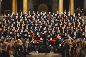 The Bach Choir and the Philharmonia Orchestra playing in concert