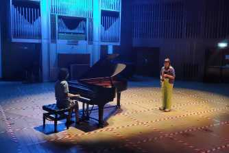 An duo improvise on saxophone and piano