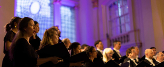 Members of the Monteverdi Choir singing at St Martin-in-the-Fields, London