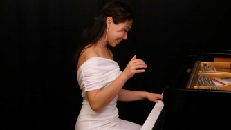 Nurry Lee white dress piano