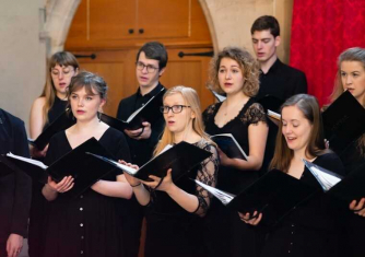 Members of Schola Cantorum singing