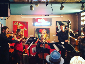 Musicians on stage at 'Library'